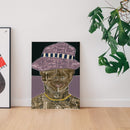 Framed artwork on a wall with a plant in the corner